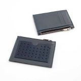 Mitta mini men's leather wallet with a perforated card pocket on one side and 3 card pockets and a compartment on the other side. In a dolphin blue-dark blue color combination. With a zippered compartment for small items.