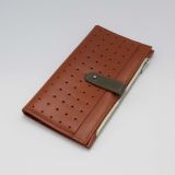 Mitta women's leather long wallet from the front. Front pocket with a hole for a mobile phone. Orange-olive color